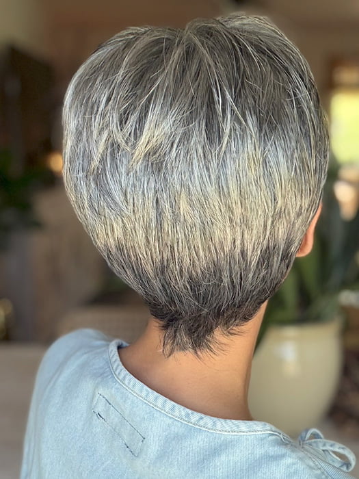 Roxie is wearing TESS by JON RENAU in color 92 MOONLIGHT | Pure White with 5% Medium Brown Front, Grey with 30% Medium Brown Middle, Dark Brown with 65% Grey Nape
