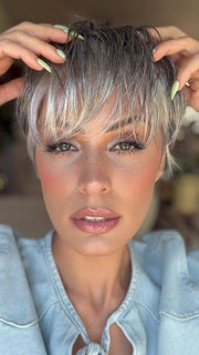 Roxie is wearing TESS by JON RENAU in color 92 MOONLIGHT | Pure White with 5% Medium Brown Front, Grey with 30% Medium Brown Middle, Dark Brown with 65% Grey Nape