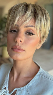 Roxie is wearing TESS by JON RENAU in color FS17/101S18 PALM SPRINGS BLONDE | Light Ash Blonde w/ Pure White Natural Violet, Shaded w/ Dark Natural Ash Blonde