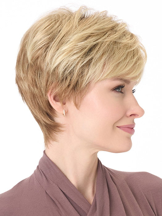 Model is wearing TIFFANY by ENVY in color SPARKLING CHAMPAGNE | Medium Brown roots with overall Strawberry Blonde base and soft Golden Blonde highlights