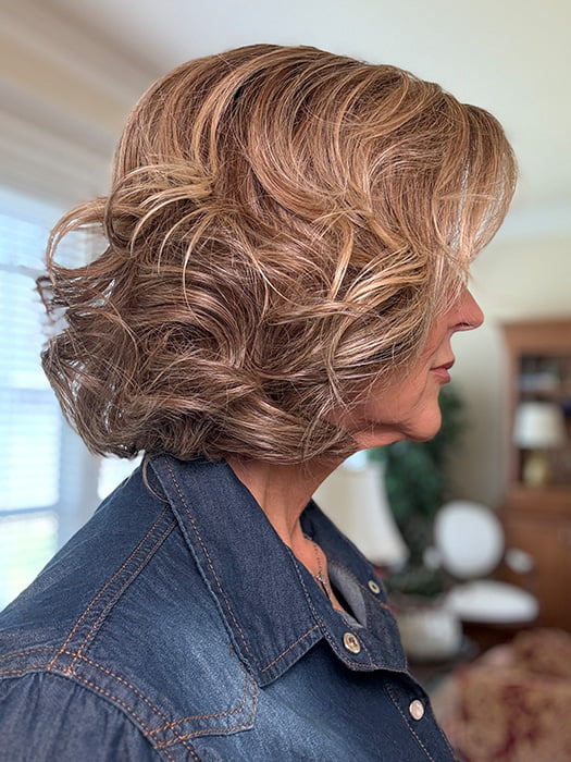Eileen @crazywiglady is wearing TWAIN by BELLE TRESS in color BROWN SUGAR BLONDE-R | A warm, dimensional blend of medium brown and golden blonde highlights with natural-looking darker roots for depth and a sun-kissed finish.