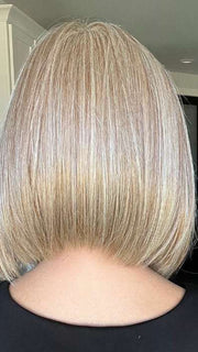 Lisa @beautifulyouwigreviews wearing CURRENT EVENTS by RAQUEL WELCH WIGS in color RL14/22SS SHADED WHEAT | Dark Blonde Evenly Blended with Platinum Blonde with Dark Roots
