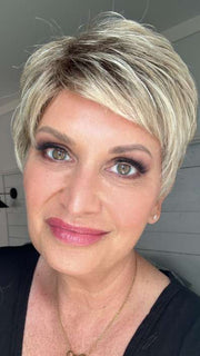 Emily H. @she_sheds_more wearing TAB by ELLEN WILLE in color SANDY BLONDE ROOTED | Medium Honey Blonde, Light Ash Blonde, and Lightest Reddish Brown blend with Dark Roots

