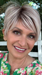 Emily H. @she_sheds_more wearing LINK by ELLEN WILLE in color PASTEL ROSE ROOTED | Pink and Pearl Blonde Blend with Light Brown Roots

