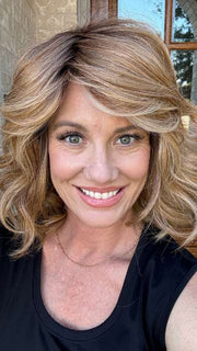 Jenny B. @thewiggygirl wearing EDITOR'S PICK ELITE by RAQUEL WELCH WIGS in color RL14/25SS | Shaded Honey Ginger | Dark Blonde Evenly Blended with Medium Golden Blonde With Dark Roots | outside natural lighting
