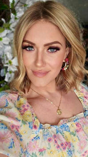 Amber @fabricatingfringe wearing CHARLOTTE by ENVY BY ALAN EATON in color SPARKLING CHAMPAGNE | Medium Brown roots with overall Strawberry Blonde base and soft Golden Blonde highlights
