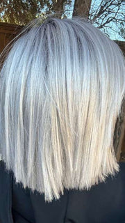Mel B. @mels.be.ageless wearing ELLIS by ESTETICA in color SILVERSUN/RT8 | ICED BLONDE WITH SOFT SAND & GOLDEN BROWN ROOTS
