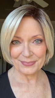 Mel B. @mels.be.ageless wearing EVE by ENVY BY ALAN EATON in color PLATINUM SHADOW | Light Blonde with Dark Roots
