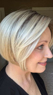 Mel B. @mels.be.ageless wearing EVE by ENVY BY ALAN EATON in color PLATINUM SHADOW | Light Blonde with Dark Roots
