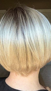 Mel B. @mels.be.ageless wearing EVE by ENVY BY ALAN EATON in color PLATINUM SHADOW | Light Blonde with Dark Roots
