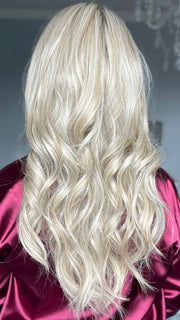 Sandy @i_be_wiggin wearing LONG TOUSLED WAVES by HAIRDO in color SS19/23 SHADED BISCUIT | Cool Platinum Blonde with subtle highlights and Medium Brown roots