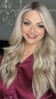 Sandy @i_be_wiggin wearing LONG TOUSLED WAVES by HAIRDO in color SS19/23 SHADED BISCUIT | Cool Platinum Blonde with subtle highlights and Medium Brown roots PPC MAIN IMAGE 