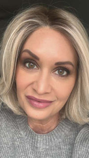 Emily H. @she_sheds_more wearing Alicante by BelleTress in shade CRUSHED ALMOND BLONDE R | A soft Neutral Light Blonde with a Light and Medium Blended Root Color.