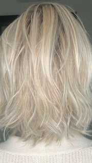 Emily H. @she_sheds_more wearing Alicante by BelleTress in shade CRUSHED ALMOND BLONDE R | A soft Neutral Light Blonde with a Light and Medium Blended Root Color.