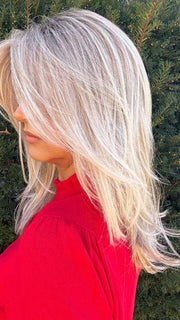 Sandy @i_be_wiggin wearing SEVILLE by BelleTress in color MILKSHAKE BLONDE R | A mixture of Light Sandy Brown, Highlighted with Light Ash Blonde with a Hint of Light Platinum Blonde with a Medium Root Color