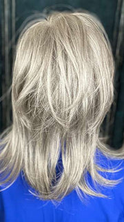 Mel B. @mels.be.ageless wearing HARLEE by NORIKO in color SILVER-STONE | Dark Brown Base with Multi Grey Shades Blended
