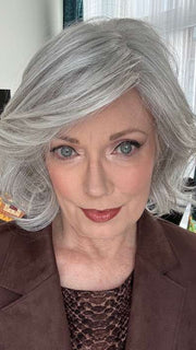 Mel B. @mels.be.ageless wearing CROWD PLEASER by RAQUEL WELCH WIGS in color RL56/60 SILVER MIST | Lightest Gray Evenly Blended with Pure White
