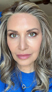 Emily H. @she_sheds_more wearing CAROLINE by BELLETRESS in color SUNKISSED ALMOND R | A blend of Medium and Light Brown with Light Gold Blonde Highlights and a hint of Cooler Blonde, rooted with Medium and Light Brown
