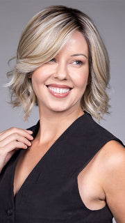 Model is wearing VICTORIA by BELLETRESS in color BUTTERBEER R | Dark Brown Base and Root that transitions smoothly into a buttery blonde, infused with creamy honey and toffee tones