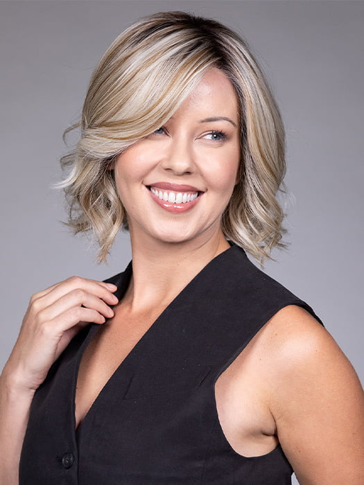 Model is wearing VICTORIA by BELLETRESS in color BUTTERBEER R | Dark Brown Base and Root that transitions smoothly into a buttery blonde, infused with creamy honey and toffee tones