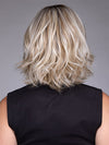 Model is wearing VICTORIA by BELLETRESS in color BUTTERBEER R | Dark Brown Base and Root that transitions smoothly into a buttery blonde, infused with creamy honey and toffee tones