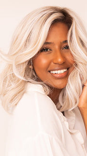Sophia wearing VERO by RENE OF PARIS in WHITE-ROSE-BLOND-R | White Blond Base with subtle Warm Brown Highlights