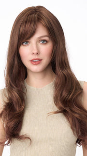 Model is wearing WENDI by ENVY in color CINNAMON-RAISIN | Medium Brown with Auburn and Cinnamon highlights