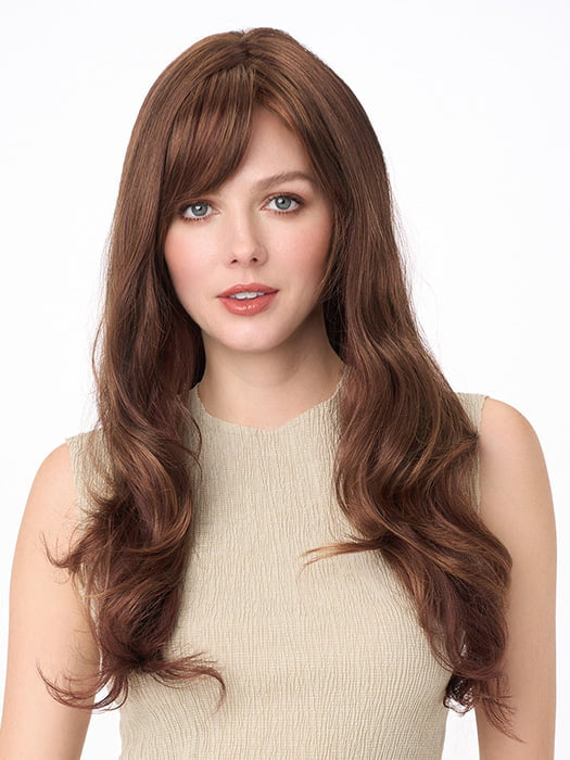 Model is wearing WENDI by ENVY in color CINNAMON-RAISIN | Medium Brown with Auburn and Cinnamon highlights
