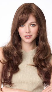 Model is wearing WENDI by ENVY in color CINNAMON-RAISIN | Medium Brown with Auburn and Cinnamon highlights