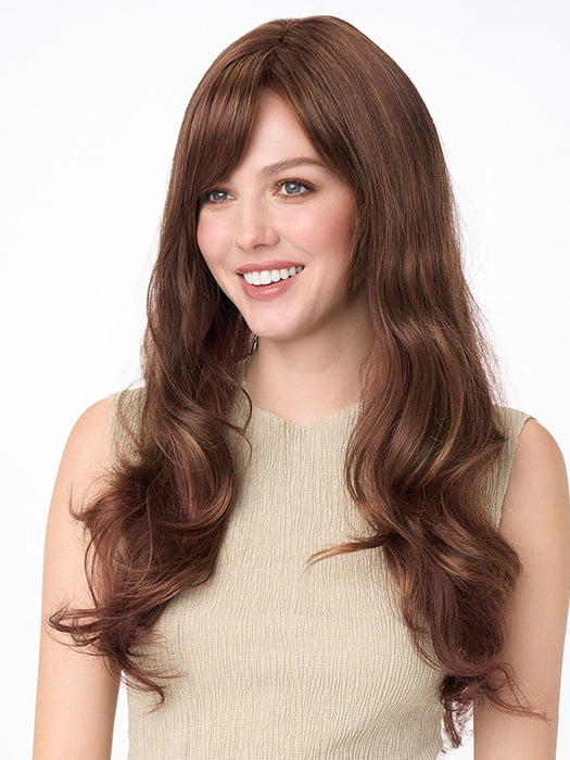 Model is wearing WENDI by ENVY in color CINNAMON-RAISIN | Medium Brown with Auburn and Cinnamon highlights