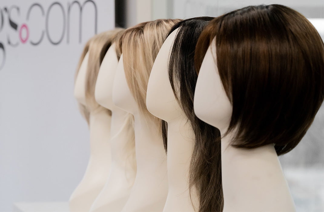 row wigs on mannequin heads