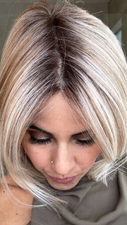 Lorena @faux.hurr.lifee wearing ZARAGOZA by BELLETRESS in color MILKSHAKE BLONDE R | A mixture of Light Sandy Brown, Highlighted with Light Ash Blonde with a Hint of Light Platinum Blonde with a Medium Root Color
