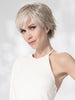 Model is wearing AVENUE SOFT by ELLEN WILLE in color SNOW MIX 60.56.58 | Pearl White, Lightest Blonde, and Black/Dark Brown with Grey Blend
