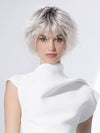 Model is wearing ESCAPE SOFT by ELLEN WILLE in color SILVER BLONDE ROOTED 60.1001.24 | Pearl White and Winter White with Lightest Ash Blonde Blend and Shaded Roots