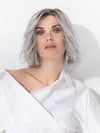 Model is wearing ESPRIT SOFT SMALL by ELLEN WILLE in color METALLIC GREY ROOTED 60.51 |  Pearl White, Darkest/Lightest Brown with Grey Blend with Shaded Roots
