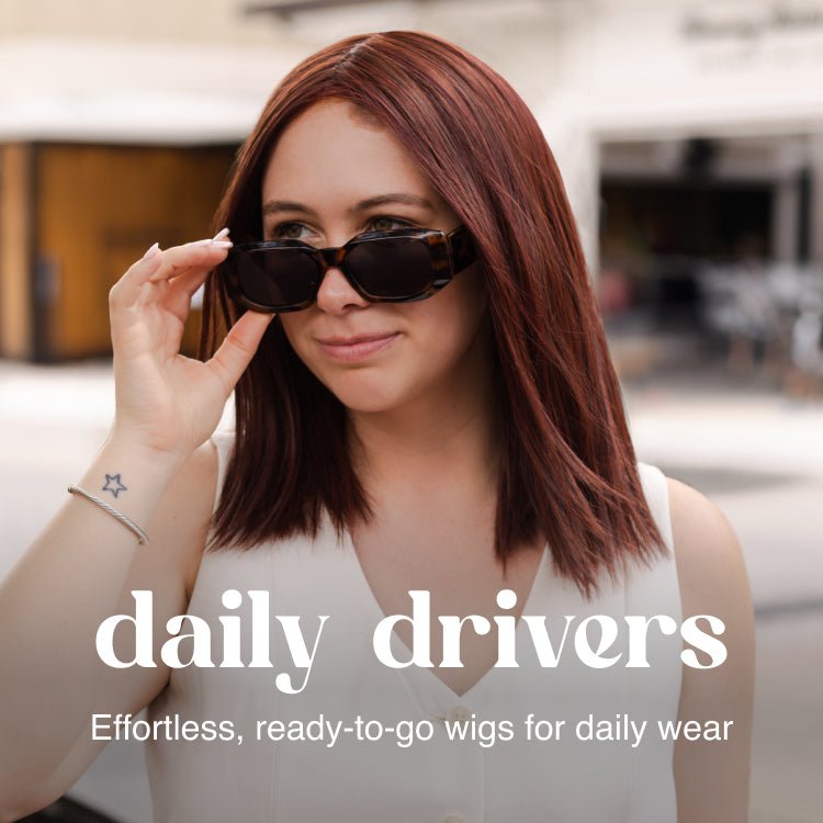 Shop Daily Driver Wigs. Image: Woman in white shirt wearing Drive by Ellen Wille.
