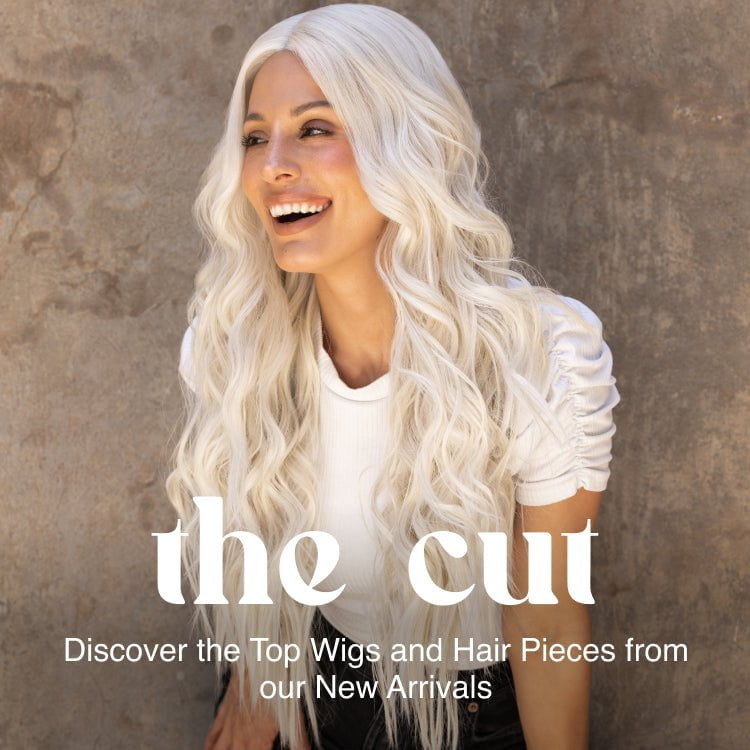 Shop The Cut. Woman in White shirt with puffy sleeves wearing Thrill Seeker by HairDo.