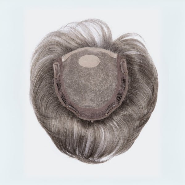 an example of a hair topper with a wefted back and sides