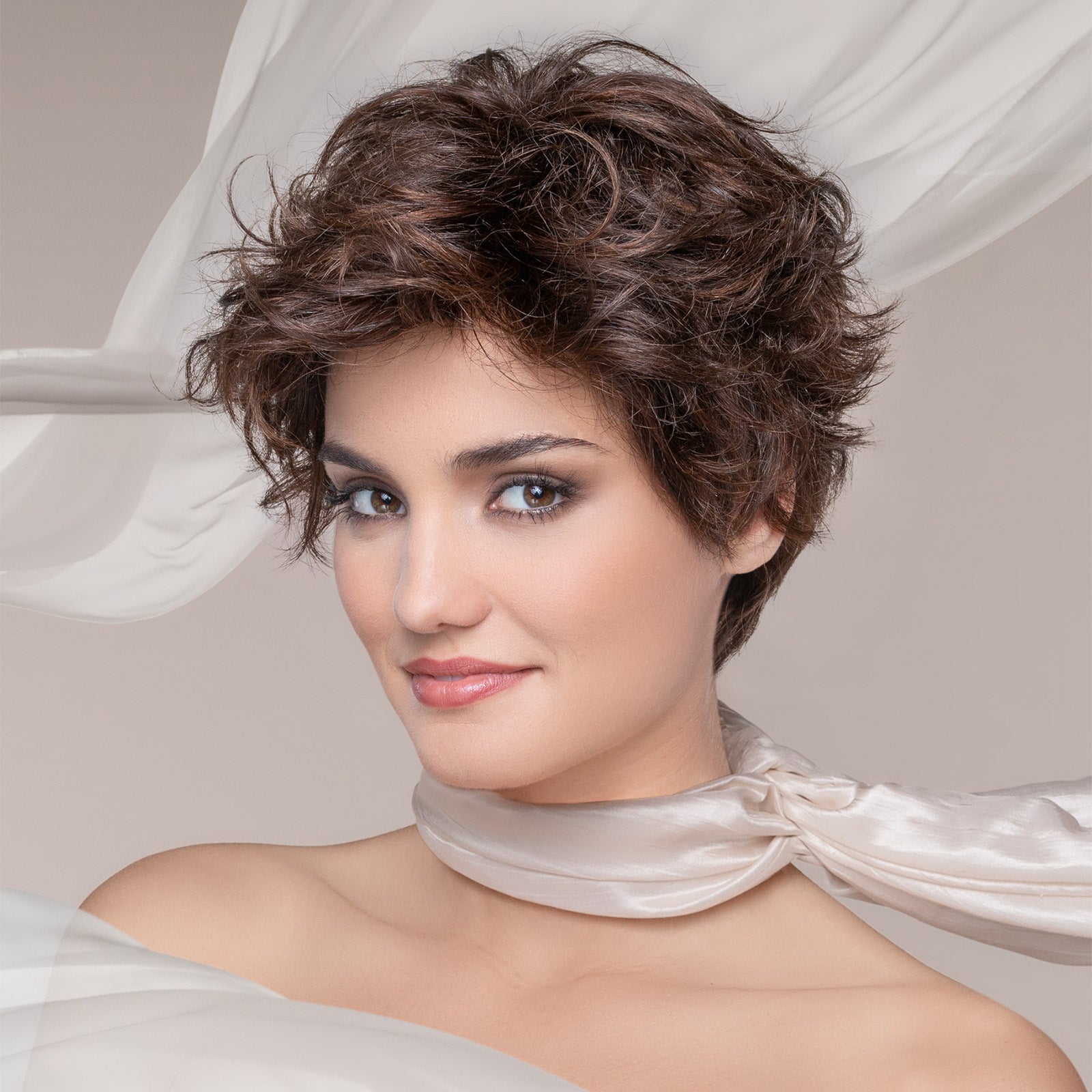 Book a free virtual consultation with a member of our client care team. Image: Woman in black dress wearing Drive by Ellen Wille.