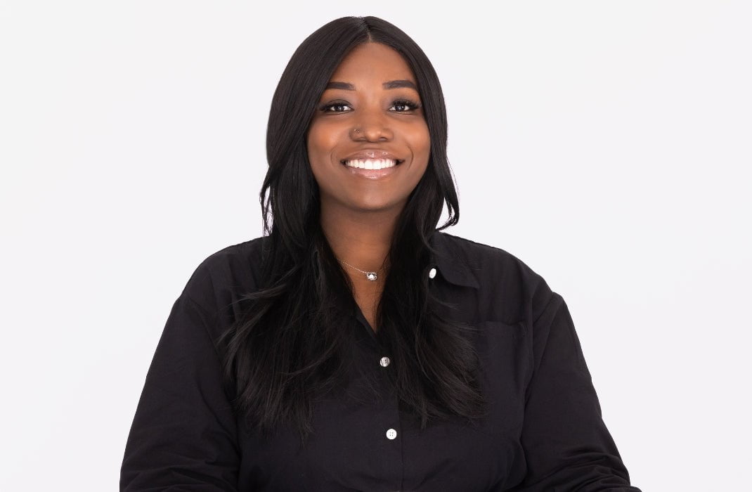 Jade Adams wearing Zara Lite by Jon Renau in shade 1B Hot Fudge