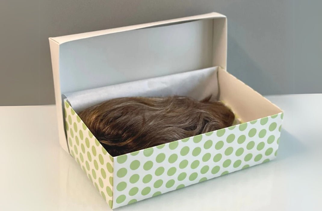 Wig stored safely in a box
