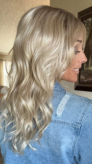 Nichole Corbett @nicholealee wearing HANA by NORIKO in color NM SANDY CREAM BLOND-R | This shade features soft golden sand tones with subtly rooted color for a natural regrowth effect. This blend of beige brown, honey, and creamy blonde transitions beautifully into lighter shades, creating a warm, versatile look that flatters any skin tone. A perfect choice for effortless, honey-warm blonde style.