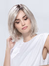 Model is wearing ICONE SMALL DELUXE by ELLEN WILLE in  SILVER BLONDE ROOTED | Pearl White and Lightest Pale Blonde Blend with Shaded Roots