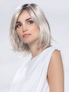 Model is wearing ICONE SMALL DELUXE by ELLEN WILLE in  SILVER BLONDE ROOTED | Pearl White and Lightest Pale Blonde Blend with Shaded Roots