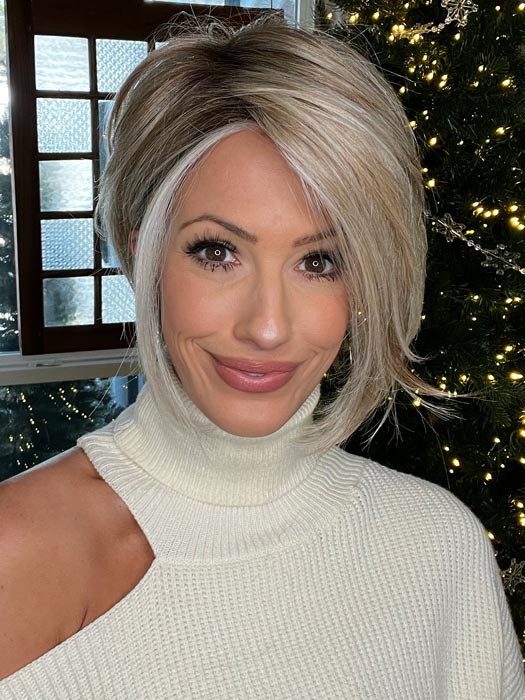 Jenna Fail in BOUDOIR GLAM by RAQUEL WELCH in color RL19/23SS SHADED BISCUIT | Light Ash Blonde Evenly Blended with Cool Platinum Blonde with Dark Roots