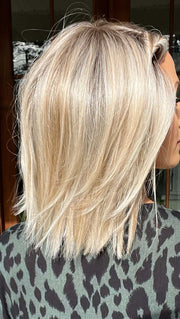 Jenna Fail @jenna_fail wearing UPSTAGE (straightened at the ends) by RAQUEL WELCH WIGS in color RL19/23SS SHADED BISCUIT | Light Ash Blonde Evenly Blended with Cool Platinum Blonde with Dark Roots