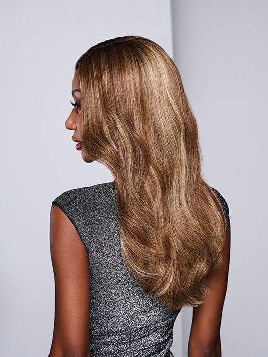 Model is wearing ATHENIAN ADVENTURE by RAQUEL WELCH in color RH9/24SS SHADED CAFE LATTE | Dark Brown with Golden Brown highlights from dark roots to ends