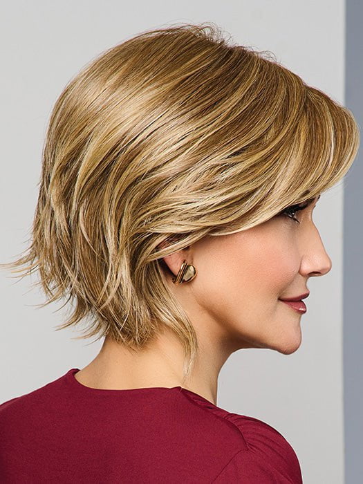 Model is wearing MAIN CHARACTER by RAQUEL WELCH in RL 13/88 GOLDEN PECAN | Neutral Medium Blonde With Pale Honey Blonde Highlight