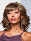 Model is wearing RL 10/12 SUNLIT CHESTNUT | Light Chestnut Brown Evenly Blended with Light Brown.