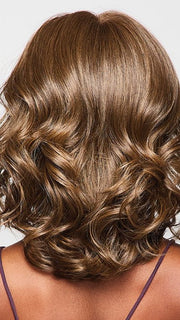 Model is wearing RL 10/12 SUNLIT CHESTNUT | Light Chestnut Brown Evenly Blended with Light Brown.